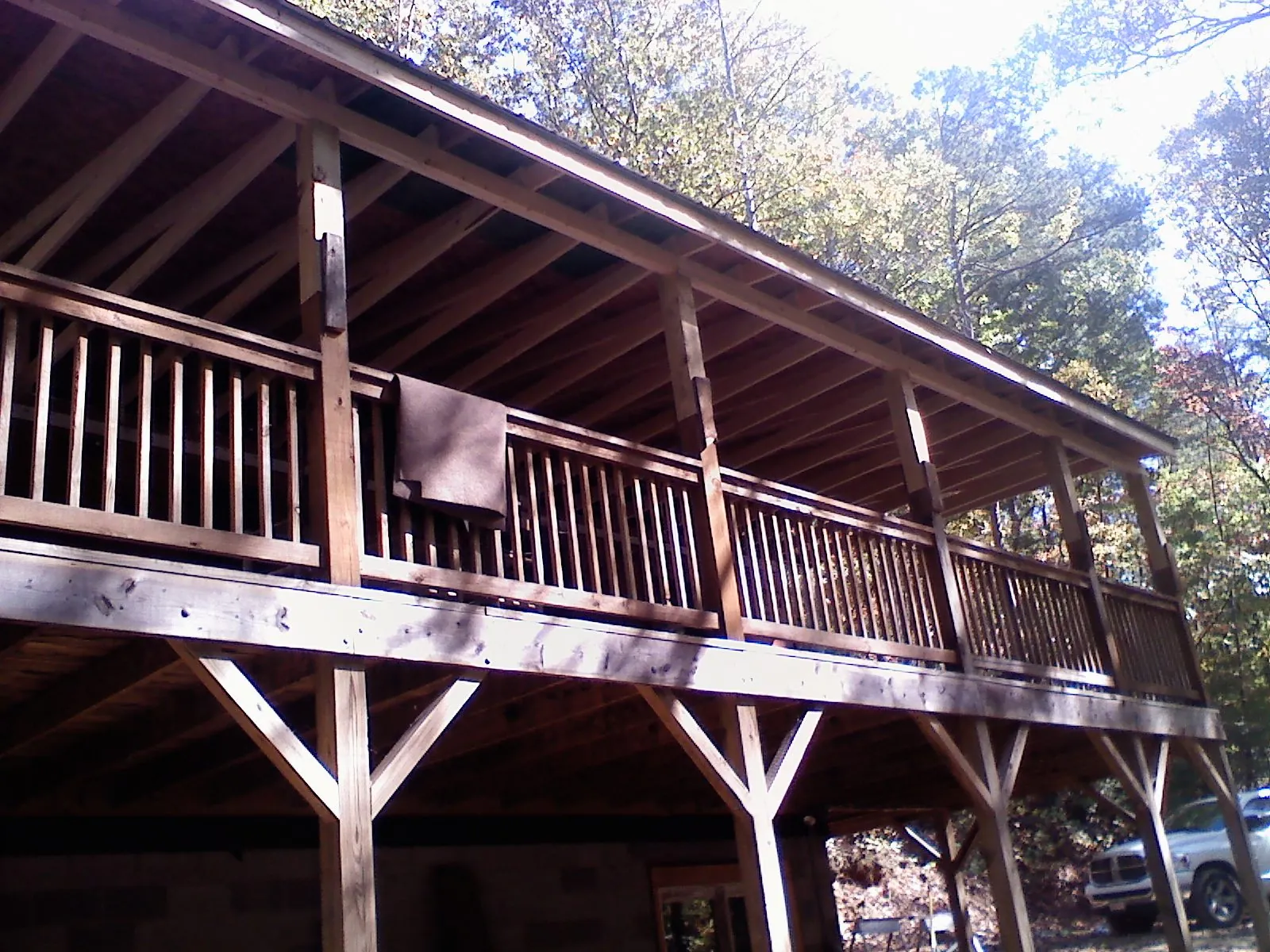 Timber framing under a new elevated porch and deck — Roof Leak Repair in Wolf Creek by Roofing Brothers